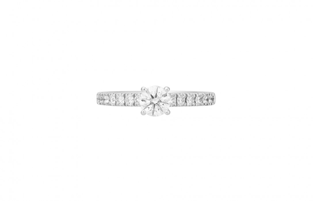 Bague solitaire quatre griffes - Or blanc 18K (2,20 g), diamants 0,10 ct - Courbet